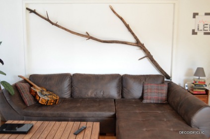 a big branch to decorate the wall of your living room